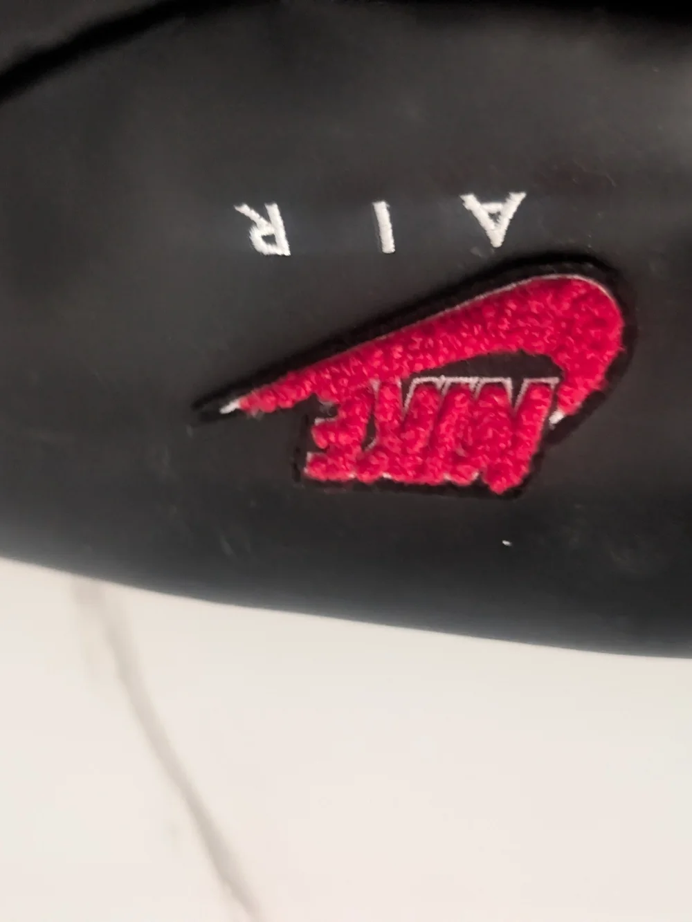 Nike Black Sling Bag with Red Logo Patch